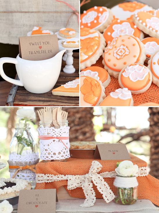 Orange themed desserts and decorations for a rustic event