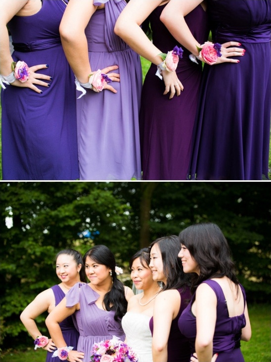 Bridesmaids in purple dresses posing for a wedding photo
