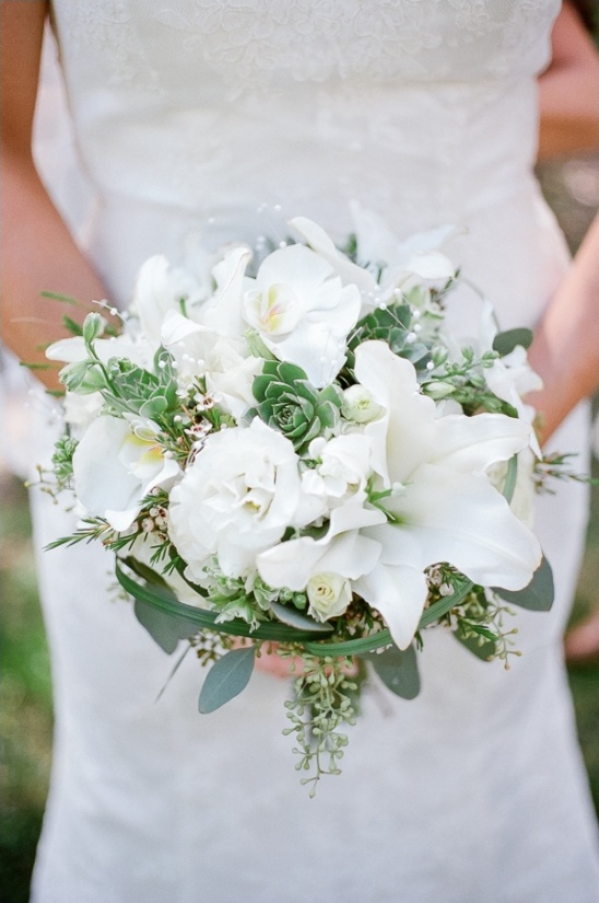 Elegant white wedding bouquet with greenery