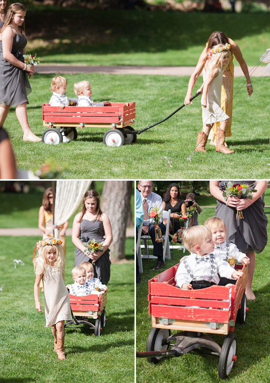 Flower girls and ring bearers in red wagon