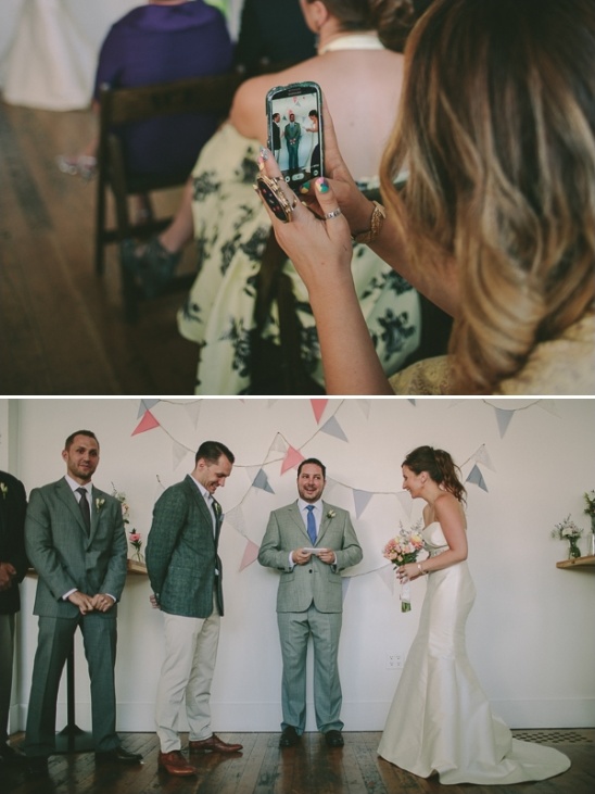 Wedding ceremony guests taking photos