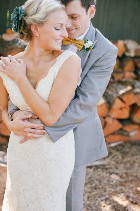 Happy bride and groom embracing on their wedding day