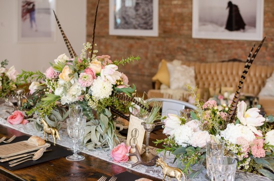 Elegant floral centerpieces on rustic table