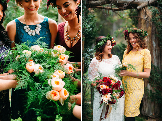Bridesmaids holding floral bouquets at outdoor wedding