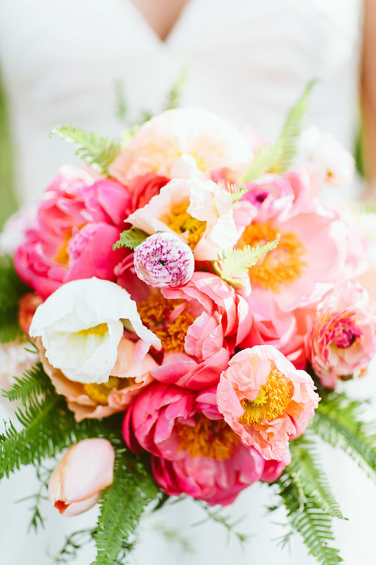 Pink and coral peony wedding bouquet close up view