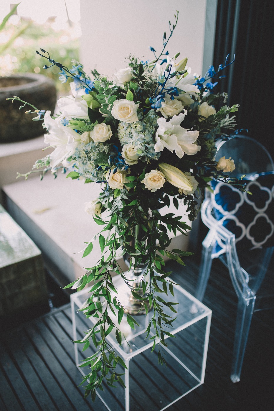 Elegant white and blue wedding flower arrangement