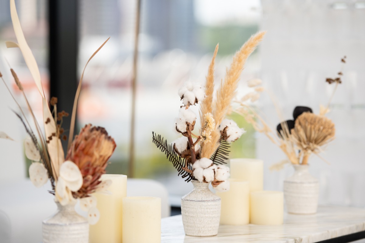 Dried flower arrangement with candles, perfect for home decor