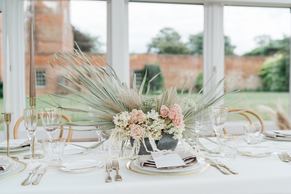 Elegant table setting with beautiful flower arrangement and decor