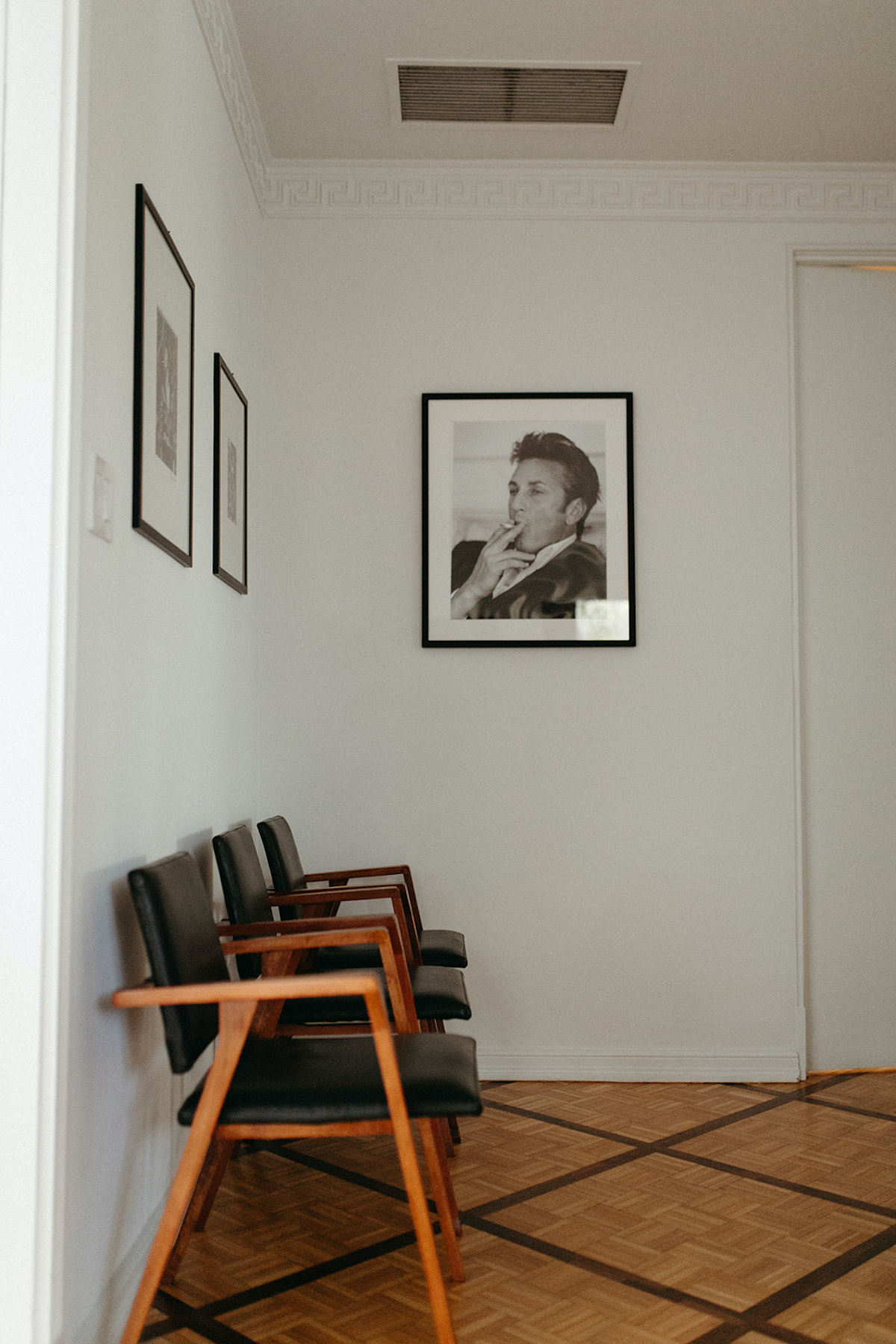 Expressive vintage waiting room with a framed photograph