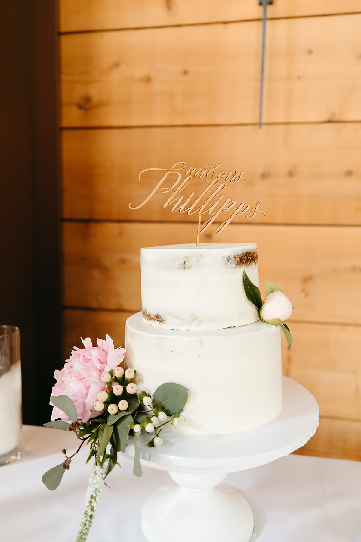 Beautiful mrs and mrs wedding cake with pink flowers